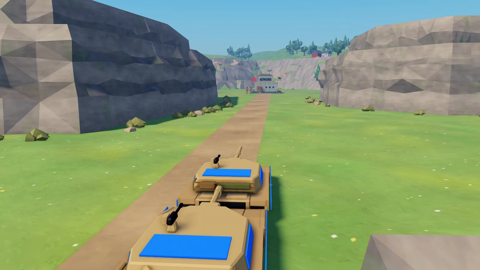 An M1A1 tank rolls down a valley road
